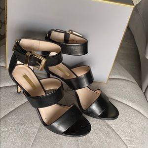 Louise et Cie Black Heels with gold buckle